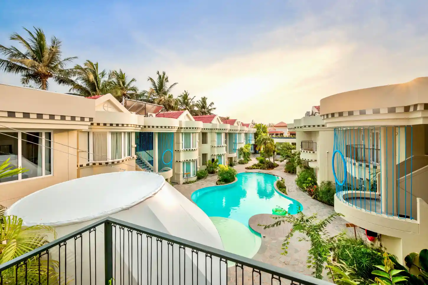 Spacious and well-lit living area at Orchid Passaros resort in South Goa